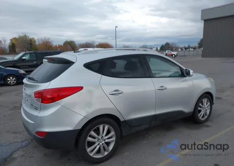 2011 Hyundai Tucson Limited z USA, uszkodzony, nr VIN KM8JU3AC1BU156431